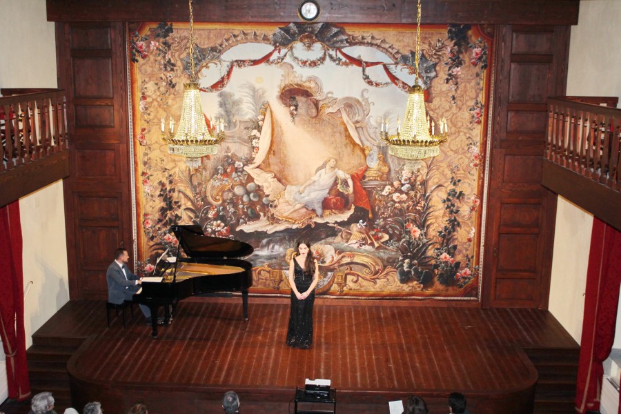 A mezzosoprano during an opera aria